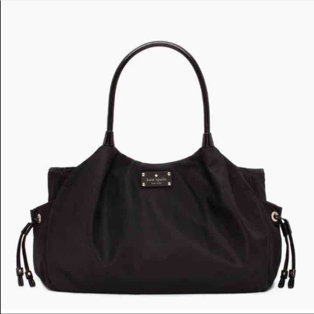 Kate Spade “stevie” baby bag.